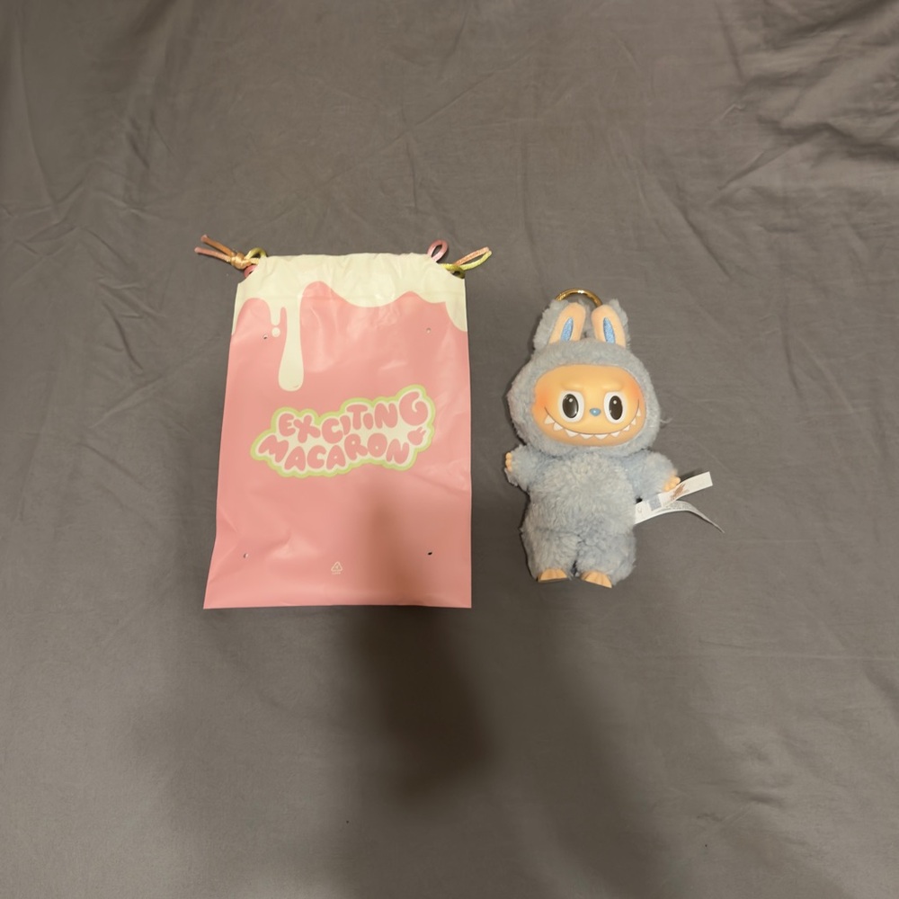 POP MART The Monsters Exciting Macaron Vinyl
Plush SEA SALT COCONUT Labubu